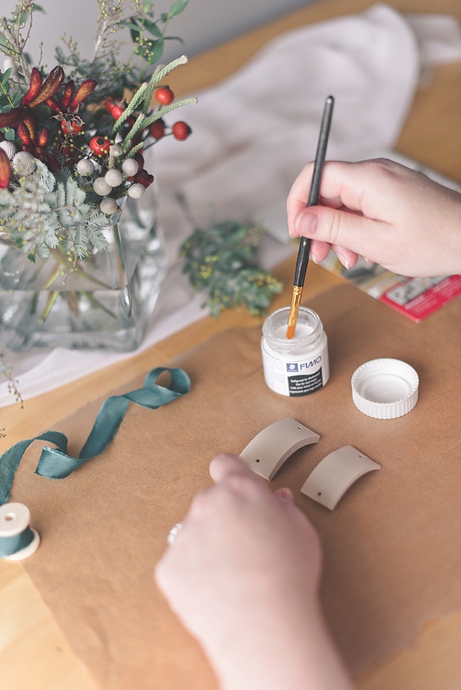 Using size adhesive for gold leaf on napkin rings